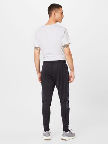 ADIDAS SPORTSWEAR Slimfit Sportbyxa 'Tiro' i svart