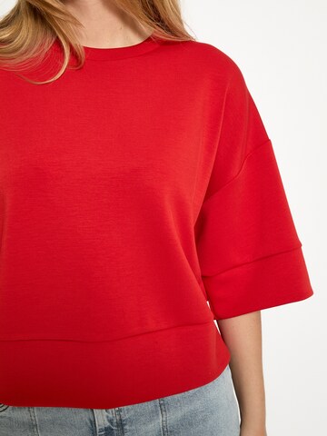 Peppercorn Sweatshirt 'Minnie' in Orange