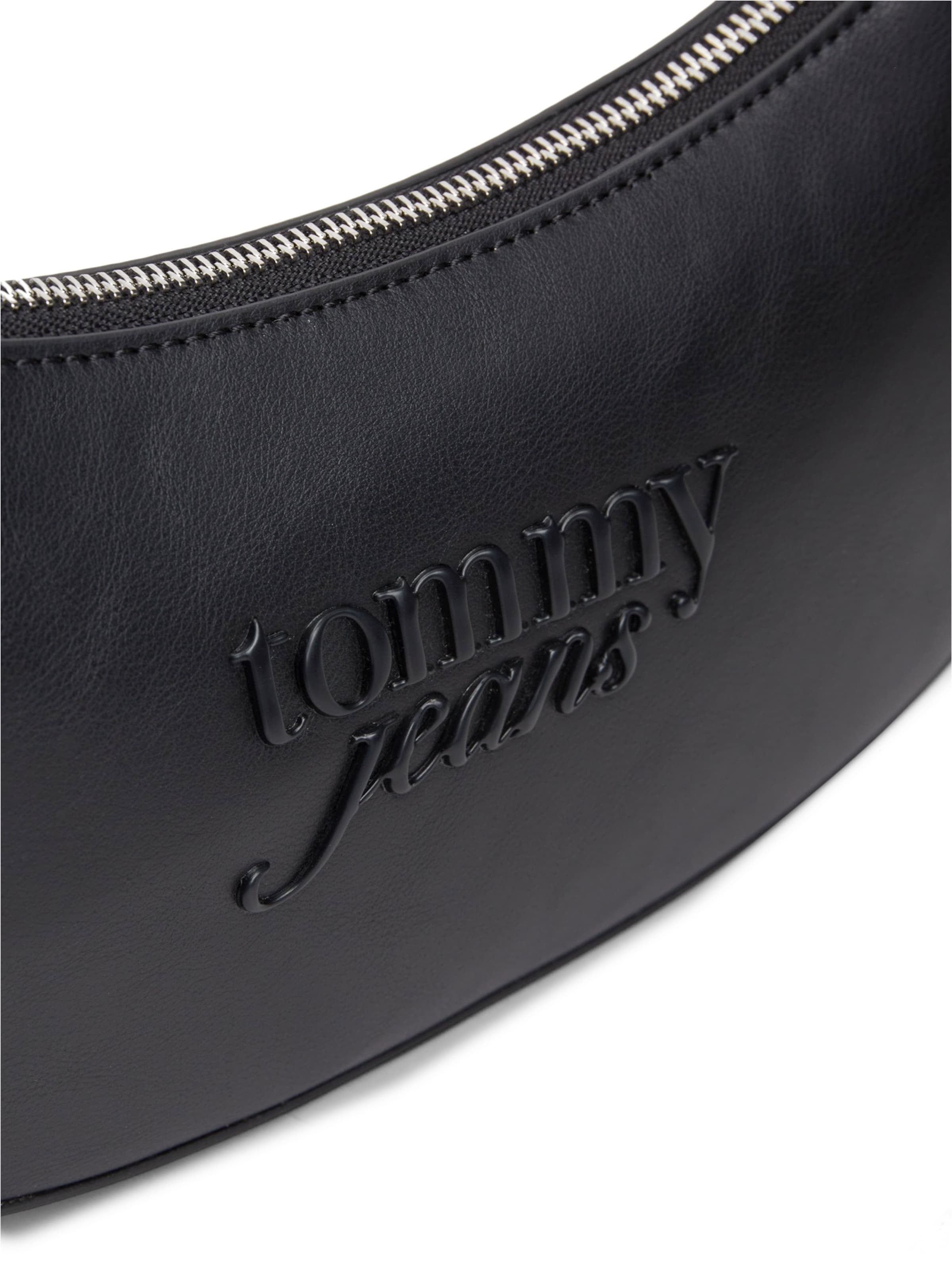 Tommy Jeans Olkalaukku 'MUST' värissä musta