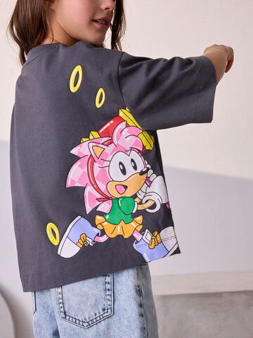 T-Shirt Next en gris