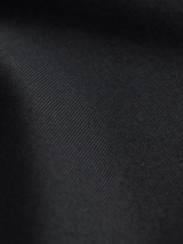 Skinny Leggings di Next in nero