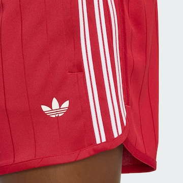 ADIDAS ORIGINALS Loose fit Trousers in Red