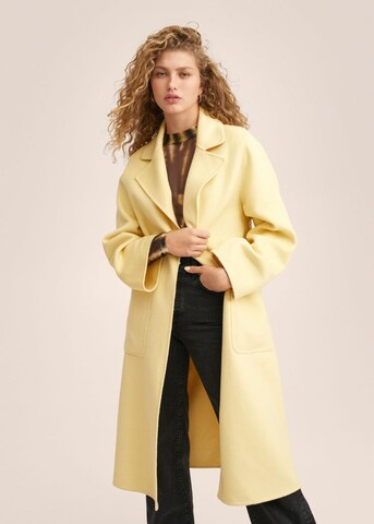 Cappotto di mezza stagione di MANGO in giallo: frontale