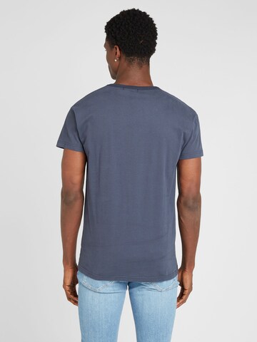 T-Shirt 'Herrenhandtasche' Derbe en bleu