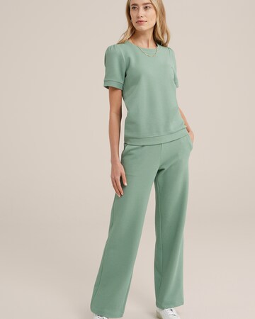 WE Fashion Loose fit Trousers in Green