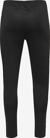 Effilé Pantalon de sport Hummel en noir