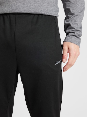 regular Pantaloni sportivi di Reebok in nero