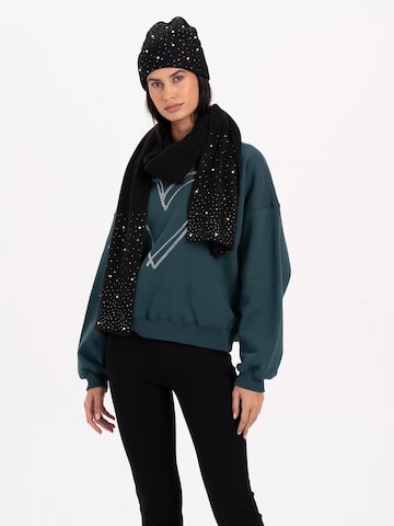 Écharpe 'Knitted scarf with glitter' MYLAVIE by Sarah Harrison en noir : devant