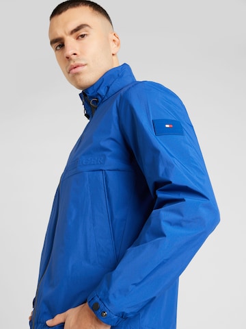 TOMMY HILFIGER Prehodna jakna 'PORTLAND' | modra barva