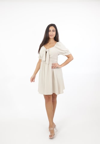 Abito di Elara in beige