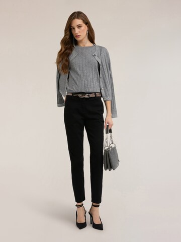 Top di MOTIVI in grigio