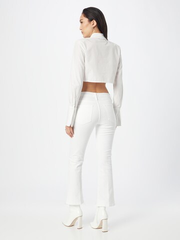 FRAME Flared Jeans in White