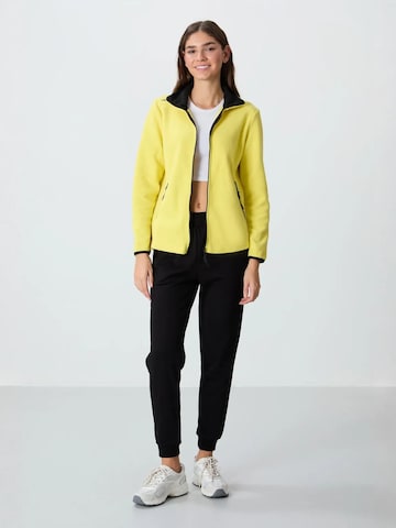 Tommy Life Fleece jas in Geel