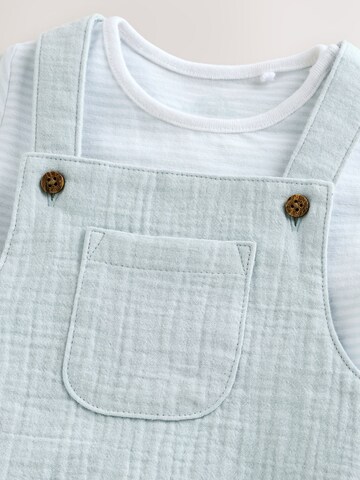 Next Set: Latzhose und Bodysuit in Blau
