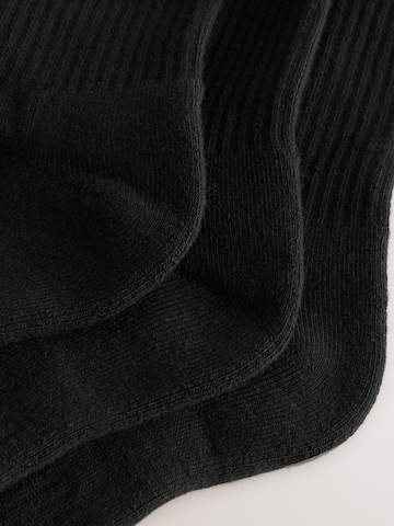self. Socks in Black
