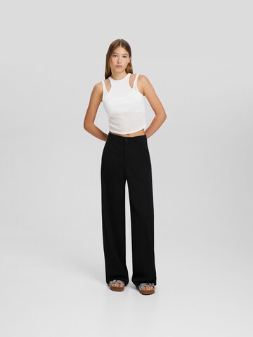 Loosefit Pantalon à plis Bershka en noir