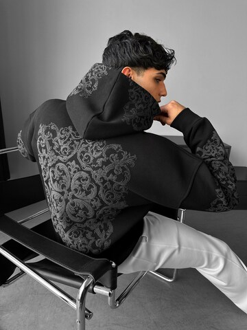 Kleidermafia Collegepaita 'Oversize Carpet Pattern Hoodie - Black and Anthracite' värissä musta