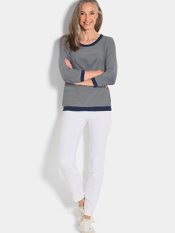 Goldner Pullover in Blau