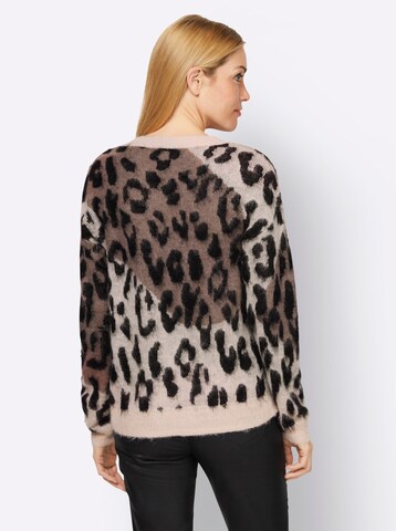 Pulover de la heine pe bej