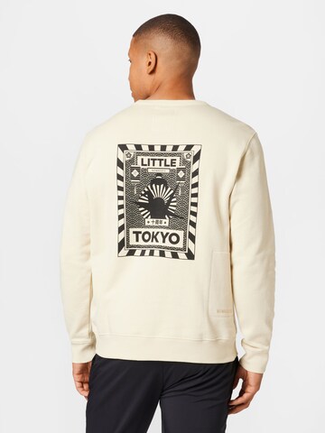 NOWADAYS Sweatshirt 'Rising Sun' in Beige