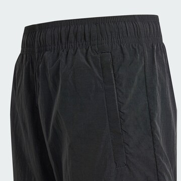 ADIDAS ORIGINALS Regular Trousers in Black