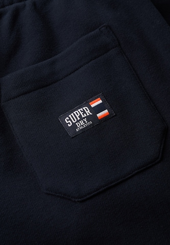 Superdry Tapered Hose 'Essential' in Blau