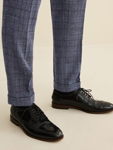 Coupe slim Pantalon à plis Next en bleu