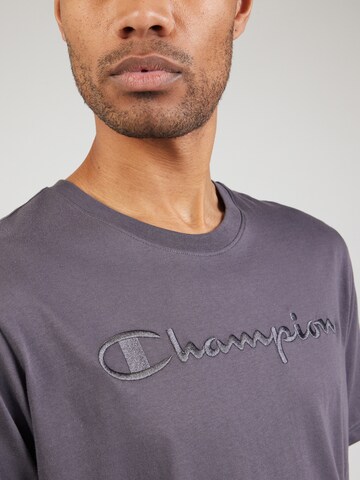 Maglietta di Champion Authentic Athletic Apparel in lilla