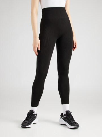 BJÖRN BORG Skinny Sportbroek 'STUDIO SEAMLESS' in Zwart: voorkant