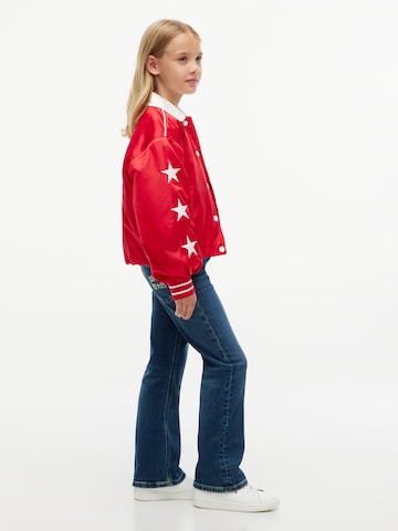 Flared Jeans di TOMMY HILFIGER in blu: lato