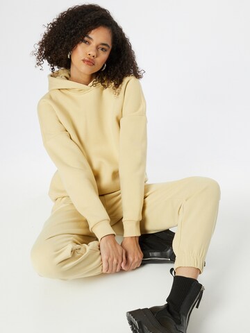 Sweat-shirt 'Alessia' ABOUT YOU x INNA en beige