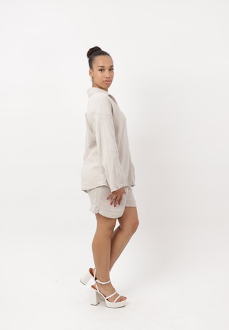 Completo pantalone di Elara in beige