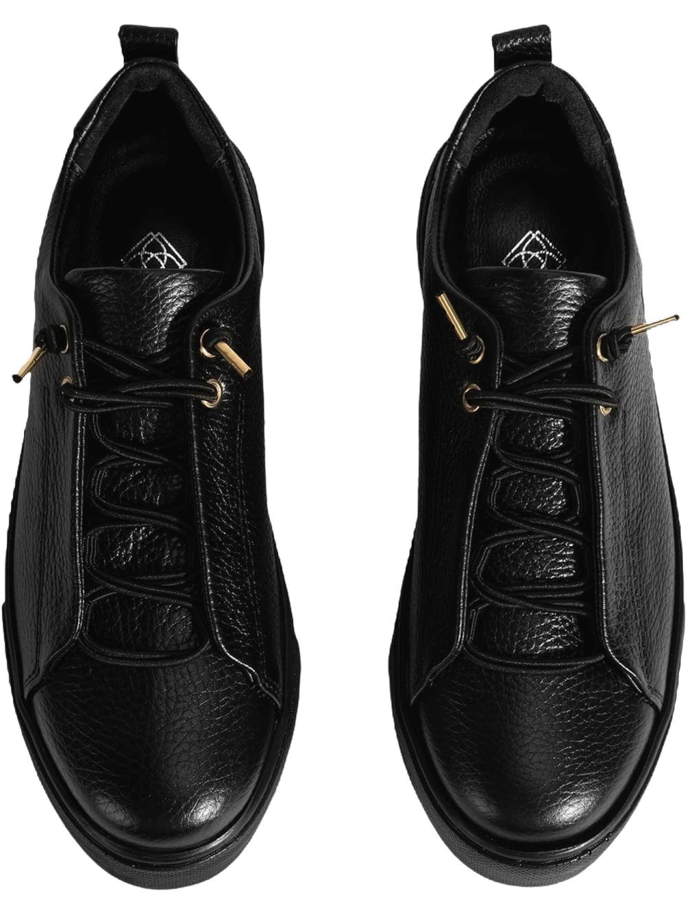 Desa Sneakers 'Slip-Ons' in Black