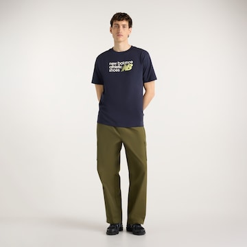 new balance - Loosefit Pantalón cargo en verde