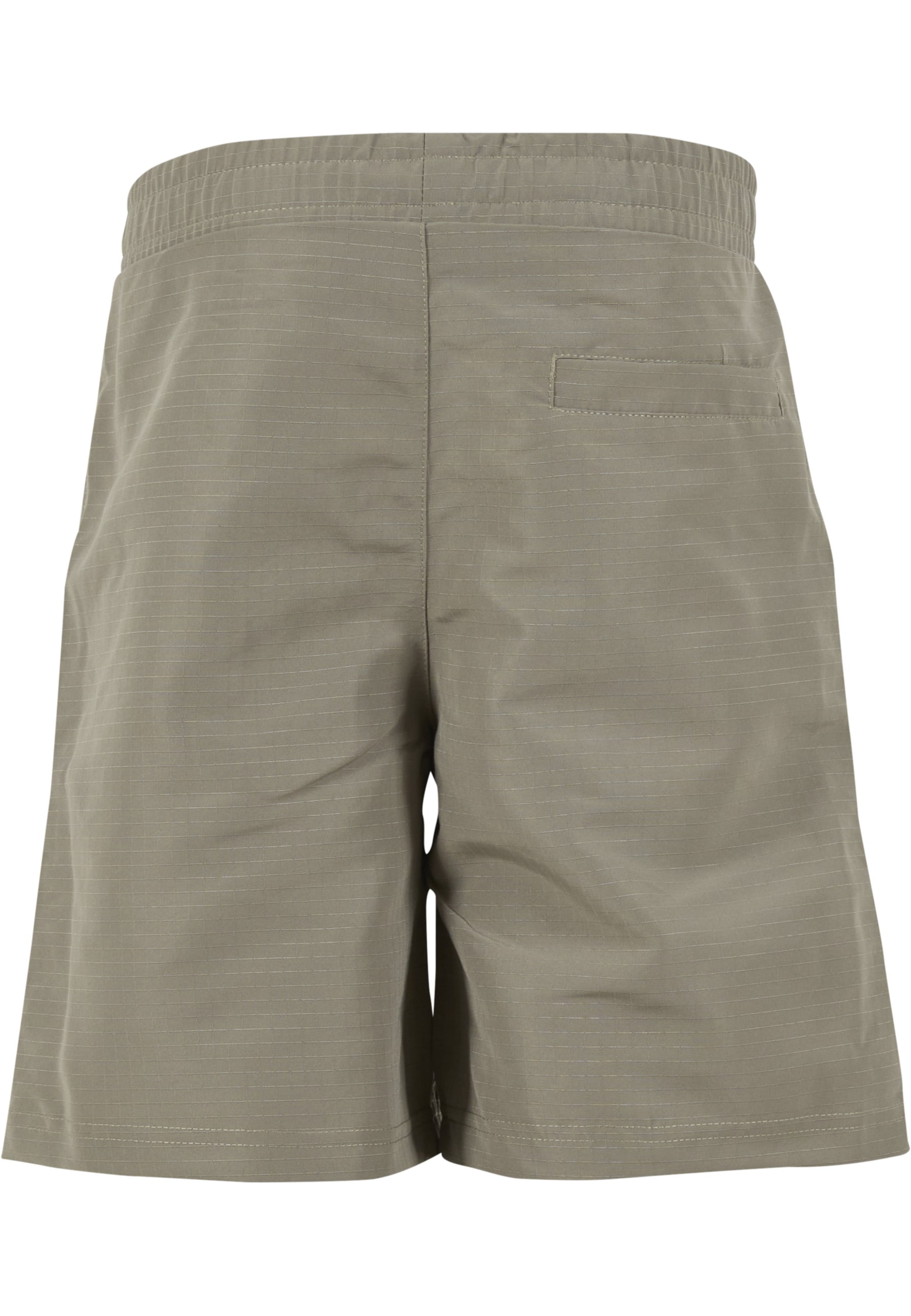 Regular Pantalon Urban Classics en vert