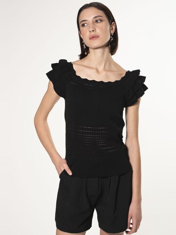 Influencer - Jersey en negro: frente