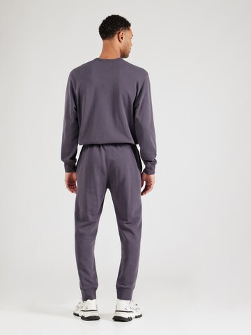 Champion Authentic Athletic Apparel Tapered Hose in Lila