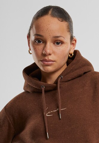 Sweat-shirt Karl Kani en marron