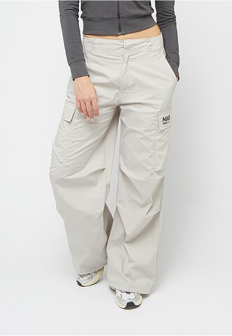 NIKE Loose fit Workout Pants in Grey: front
