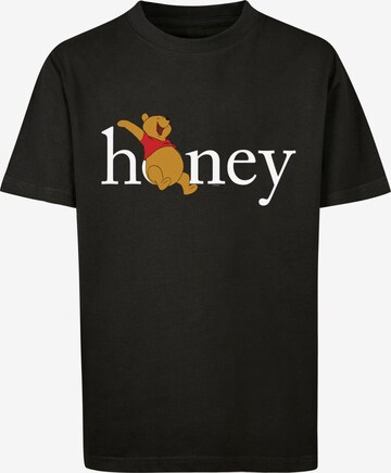 Maglietta 'Winnie The Pooh Honey' di F4NT4STIC in nero: frontale