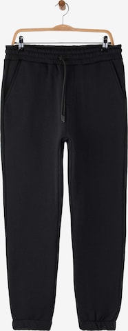 Trendyol - Tapered Pantalón en negro: frente