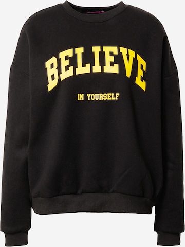 Edikted Sweatshirt 'Believe' in Schwarz: predná strana