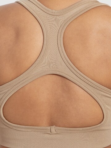 Haut de sport ' Louisa ' Smilodox en beige