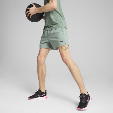 PUMA Regular Sports trousers 'Tad Essentials' in Green: front