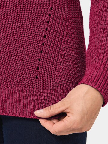 Goldner Pullover in Rot