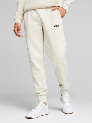 Tapered Pantaloni sport 'ESS+' de la PUMA pe alb: față