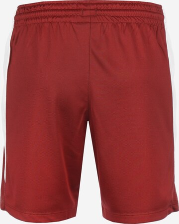 NIKE Regular Workout Pants in Red