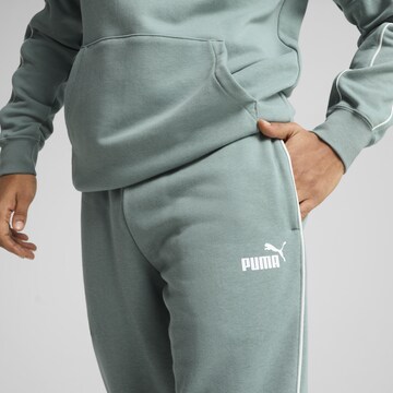 Effilé Pantalon de sport PUMA en vert