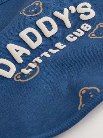 Pettorina di Next in blu