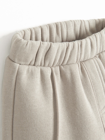 Set di Cool Club in beige